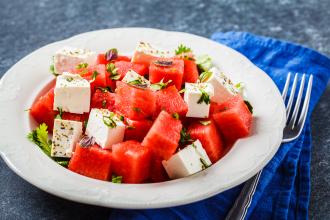 Watermelon and feta cheese salad on a plate.