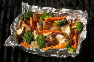 Foil dinner with roasted broccoli, carrots, and potatoes 