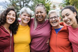 Happy multi-generational women smiling on camera after sport workout outdoor 